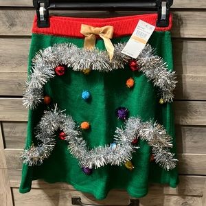 PLANET GOLD SZ SM UGLY CHRISTMAS SWEATER SKIRT WITH GARLAND, BULBS AND POM POMS